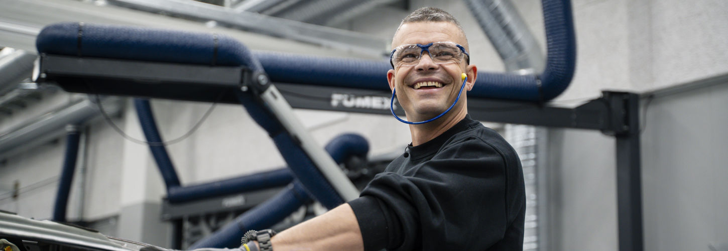 Glad mand hos Autoriseret Skadecenter